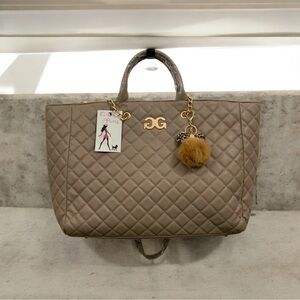 Gilda Paris-Tan Quilted Tote with trolley sleeve and Pom-Pom Accent-Retail $199